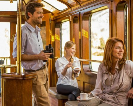 Tourists enjoying train ride to MachuPicchu | Ile Tours