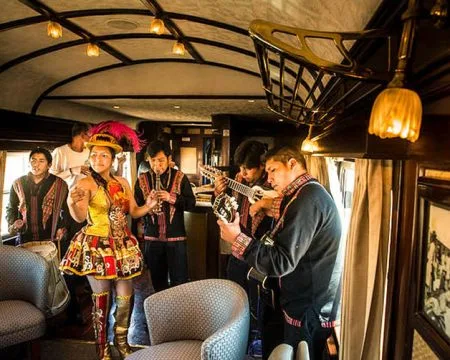 Dance with tourists on the Belmond Andean Explorer train. | Ile Tours