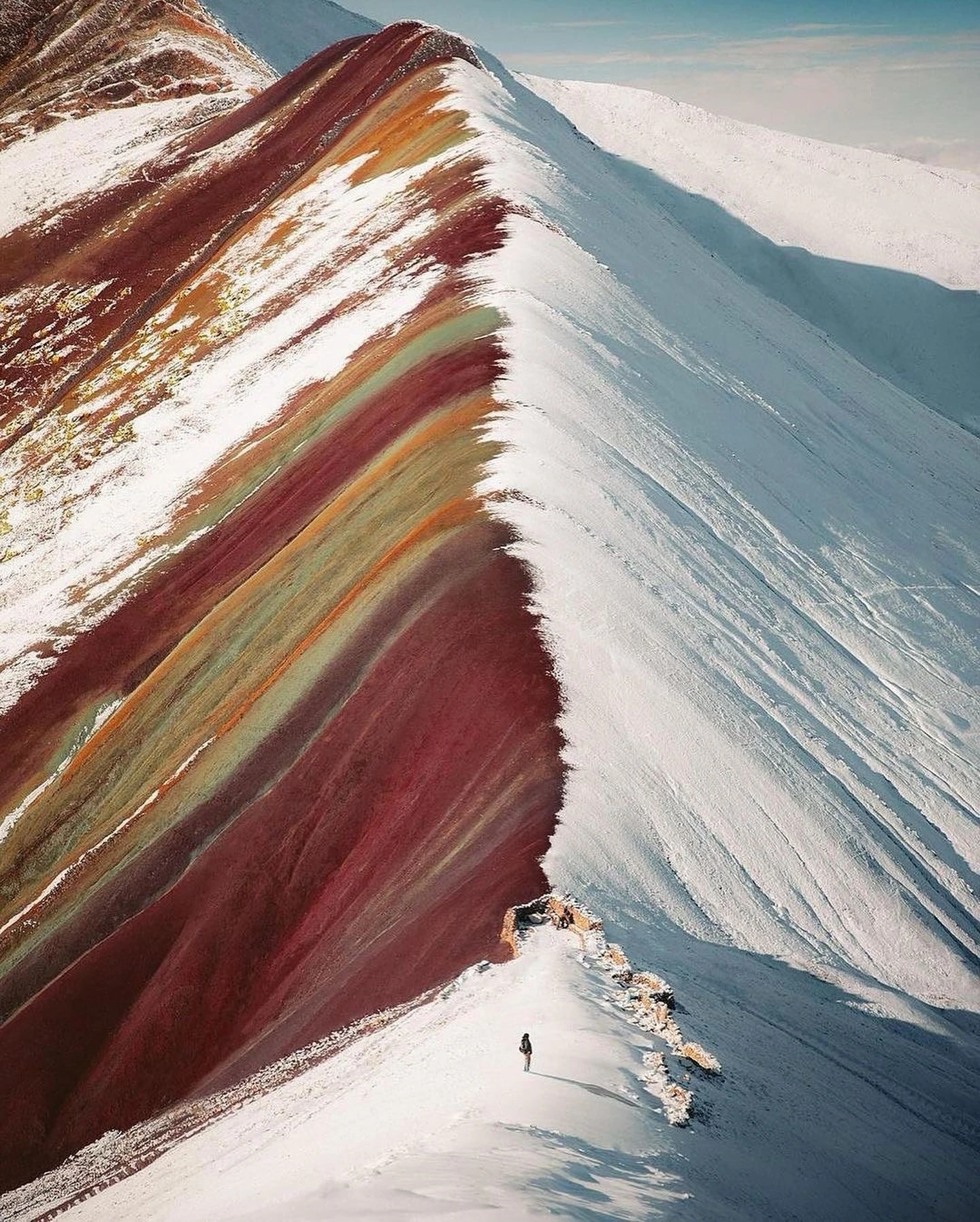 Vibrant colors of Rainbow Mountain in Peru captured in an awe-inspiring view | Ile Tours